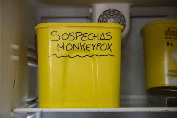 A bucket with suspected monkeypox samples is inside a fridge before being tested at the microbiology laboratory of La Paz Hospital in Madrid, Spain. 