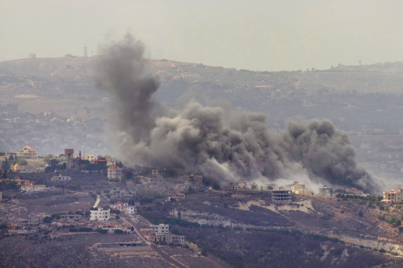 Smoke rises from Israeli airstrikes on villages in the Nabatiyeh district, seen from the southern town of Marjayoun, Lebanon.