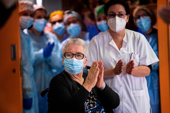 Josefa Perez, 89, after being vaccinated against coronavirus at a nursing home in the Hospitalet de Llobregat in Barcelona, Spain, on Sunday.