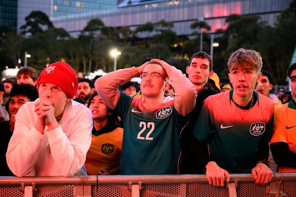 Fans react during the penalty shoot out.