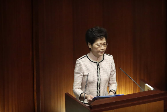 In chaotic scenes earlier this week, furious pro-democracy lawmakers forced Carrie Lam to stop a policy speech and deliver it later outside the chamber.