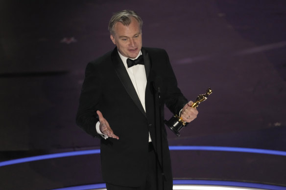 Christopher Nolan accepts the award for best director.