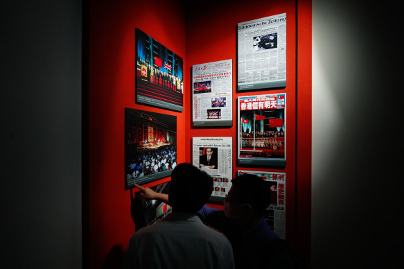 Newspapers including the Apple Daily, marking the day Hong Kong was handed over by Britain to China on display at the Hong Kong Museum of History. 