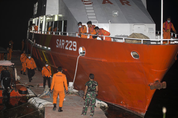 An Indonesian search and rescue crew launches from Benoa harbor in Bali. 