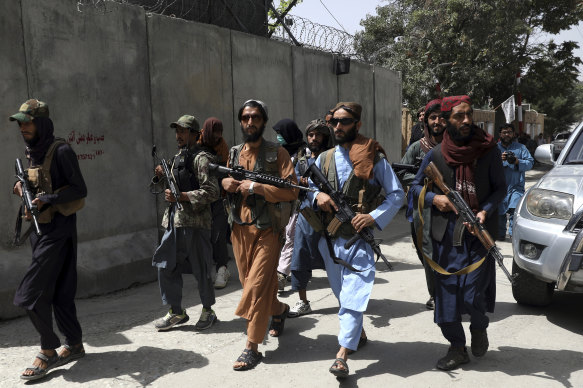 Taliban fighters patrol in Kabul on Wednesday.