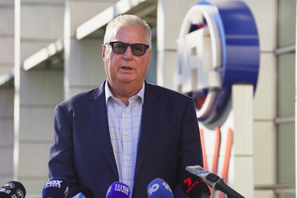 AFL footy operations boss Greg Swann speaks outside AFL House.