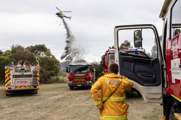 Firefighters battle a grass fire at Westgate Park.
