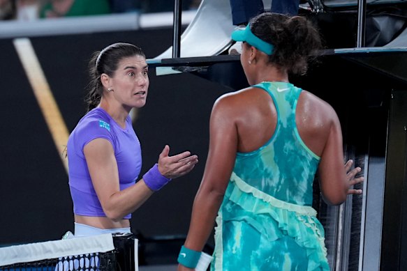 Sorana Cirstea, left, of Romania confronts Naomi Osaka, right, of Japan after their match.