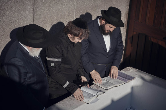 Javier Milei, centre, prays next to Chabad-Lubavitch rabbis. His representatives said he was converting to Judaism.