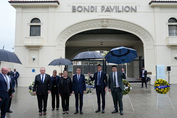 Israel’s President Isaac Herzog (centre) visits Bondi Beach.