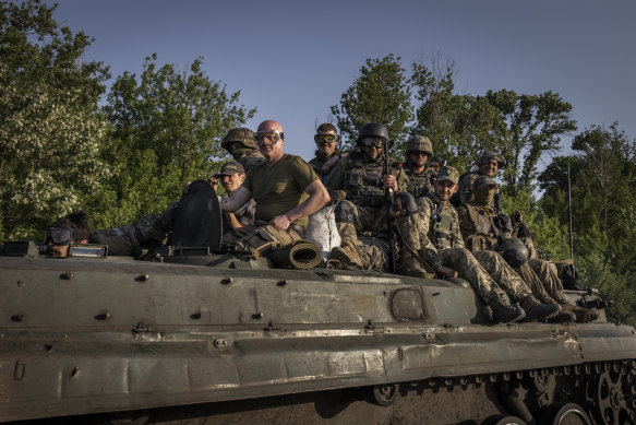 Ukrainian soldiers atop an armoured fighting vehicle in an area near Kramatorsk in the Donbas region of Ukraine on June 4.
