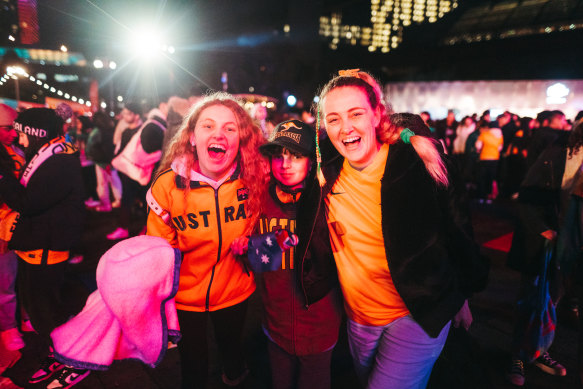 Matilda fans Zali Wood, Koby Wood, and Renee Wood celebrate the Matildas victory.