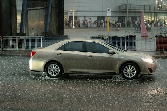 Heavy rain pelts Sydney Olympic Park.