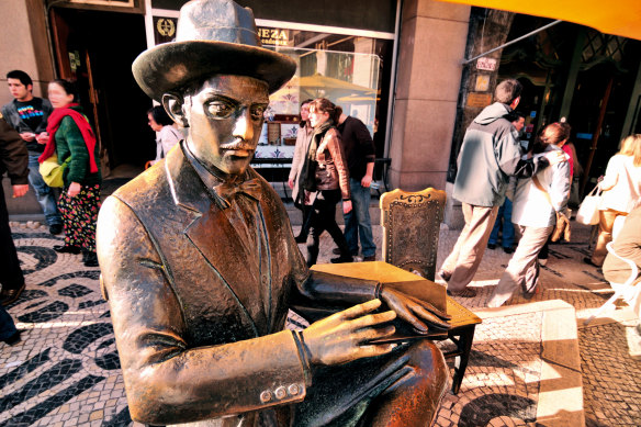 You can sit next to a statue of the Portuguese poet Fernando Pessoa outside a cafe in Lisbon he frequented.