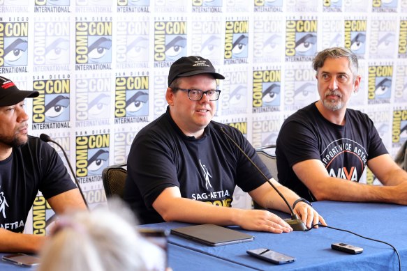 From left: SAG-AFTRA negotiator Zeke Alton, SAG-AFTRA national executive director Duncan Crabtree-Ireland, and actor and president of the National Association of Voice Actors Tim Friedlander at Comic-Con.