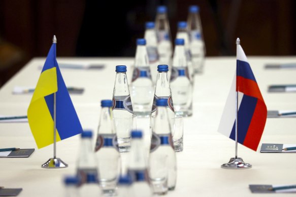 Flags on the table at the ceasefire talks in the Belarusian city of Gomel.