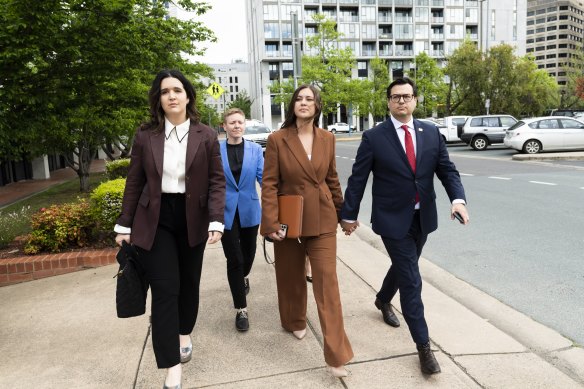 Brittany Higgins with partner David Sharaz outside the ACT Supreme Court in 2022.