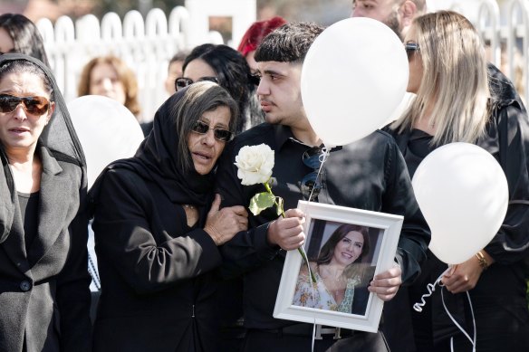 Lametta Fadlallah’s mother and son outside St Charbel’s Church on Monday morning. 