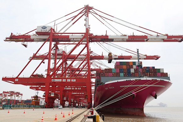 A Japanese container ship in Shanghai’s Yangshan Port. China’s lockdowns to deal with Covid are affecting the global economy.