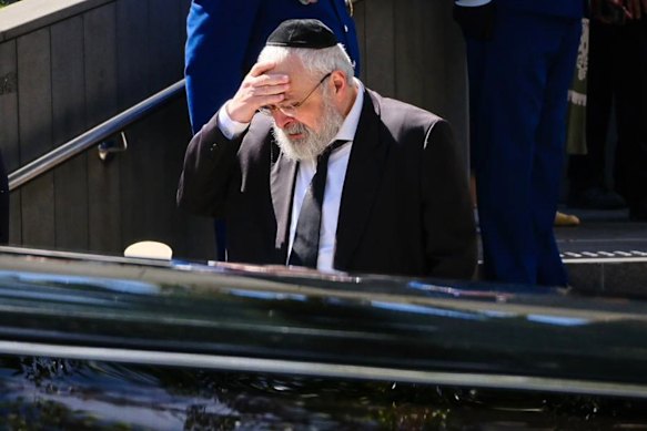 A coffin containing the body of Rabbi Eli Schlanger arrives at the Chabad of Bondi Synagogue during his funeral  last month. 