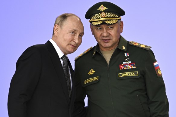 Russia’s President Vladimir Putin and Russian Defence Minister Sergei Shoigu. Russia has announced a 70 per cent increase in its military budget for next year, funded largely by oil revenues.