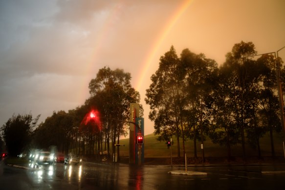 Double rainbows are seen at Sydney Olympic Park.
