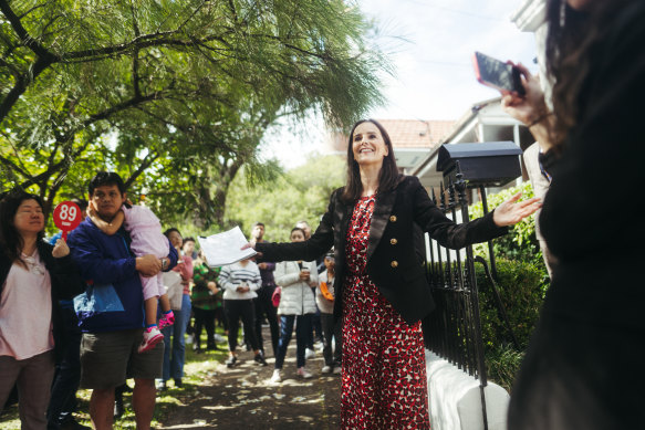 Auctioneer Karen Harvey in action at 131 Corunna Road, Stanmore.