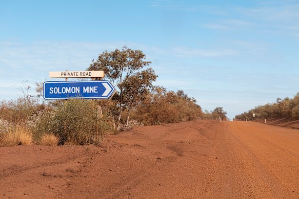 On the outskirts of Karijini National Park, the sign for Solomon Mine in the Pilbara Region in Western Australia.