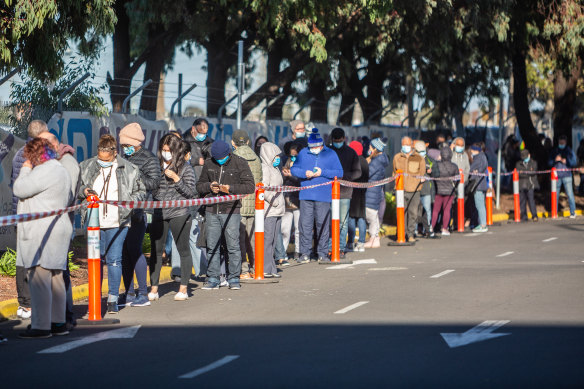 People line up at the vaccination hub at Sunshine Hospital on Sunday morning. 