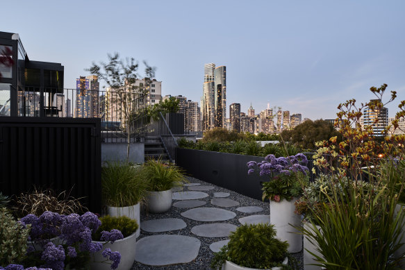 A spiral staircase leading to the rooftop terrace.