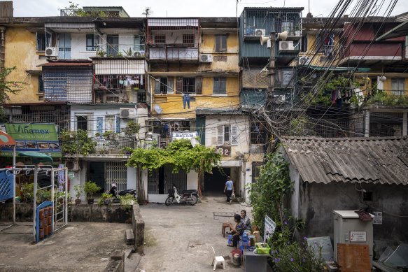 Imagine living next to one: Loudspeakers in front of apartment buildings in Vietnam.