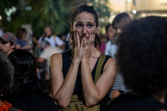 Families of the hostages, and their supporters, hold a rally at the Tel Aviv Museum Plaza.
