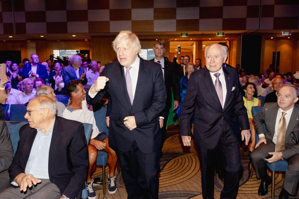 Boris Johnson was introduced by former Australian prime minister Scott Morrison and later interviewed by former PM John Howard (right).