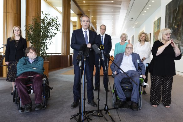 Minister for the National Disability Insurance Scheme Bill Shorten with review panel members (from left) Lisa Paul, Dougie Herd, Bruce Bonyhady, Judy Brewer and Kirsten Deane.