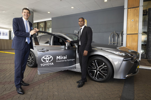 Lord Mayor Basil Zempilas and Frontier Energy managing director Sam Lee Monahan with a Toyota hydrogen vehicle.
