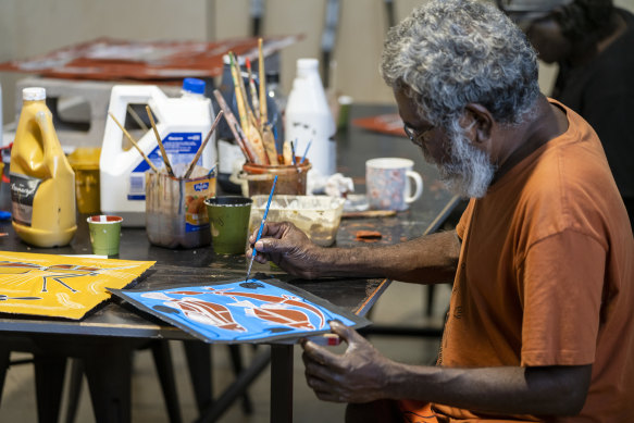 An artist at work at Marrawuddi.