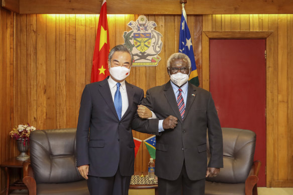 Solomon Islands Prime Minister Manasseh Sogavare (right) with visiting Chinese Foreign Minister Wang Yi in May.