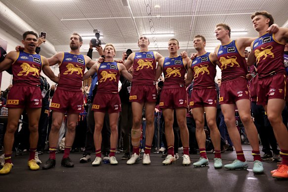 The Lions sing the team song.