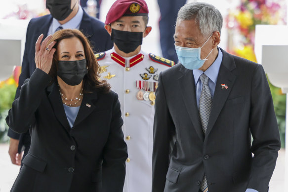 Harris is welcomed by Singapore’s Prime Minister Lee Hsien Loong at the Istana, the presidential palace, on Monday.