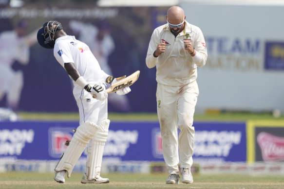 Australia’s Nathan Lyon celebrates the wicket of Sri Lanka’s Kamindu Mendis during day three in Galle