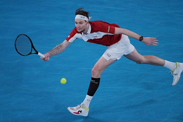 Alexander Bublik of Kazakhstan plays a forehand return.