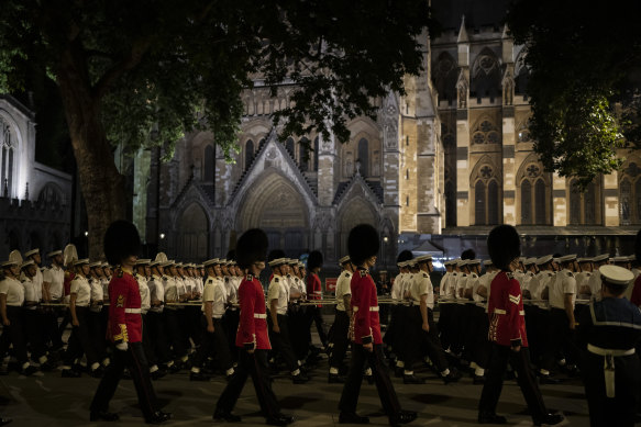 A funerary procession marches through Parliament Square during a rehearsal on September 15, 2022 for Queen Elizabeth II’s funeral in London, England.