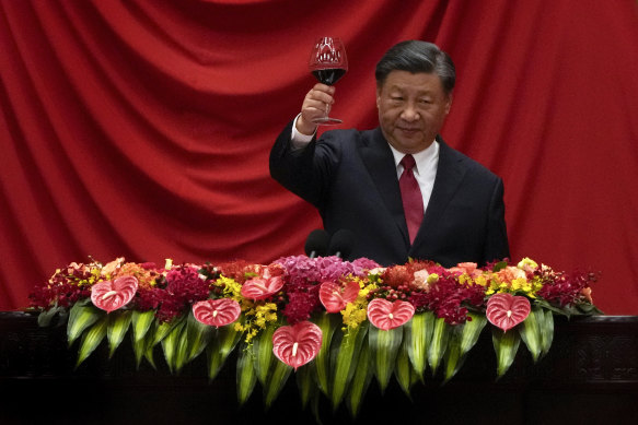 Chin chin to getting back on track: President Xi Jinping at the Great Hall of the People in Beijing last month. 