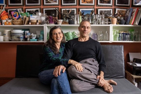 Joseph DeRuvo, who has been barefoot for 20 years, with his wife Lini Ecker at their home.