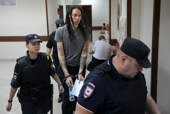 WNBA star and two-time Olympic gold medallist Brittney Griner is led into court in Khimki, just outside Moscow, on Thursday.