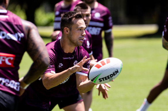 Luke Brooks trains with his new Manly teammates at narrabeen on Friday.