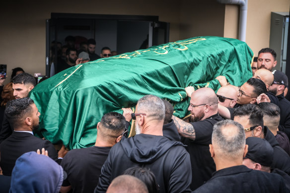 Mourners carry the casket of slain underworld figure Sam Abdulrahim at the Alawi Islamic Association in Epping on Thursday.
