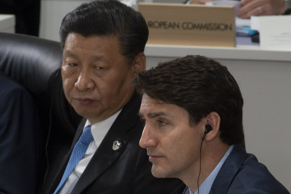 Chinese President Xi Jinping and Canadian PM Justin Trudeau at an earlier G20 Summit in Japan.