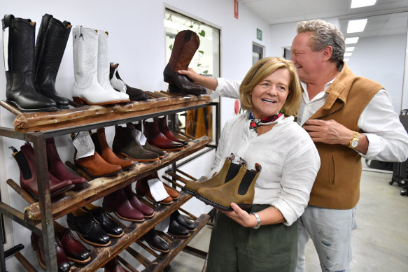 Andrew and Nicola Forrest tour an R.M. Williams workshop in Adelaide. They bought it in 2020. 