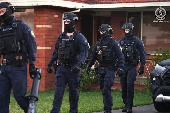 Police at the Maryong property on Wednesday.